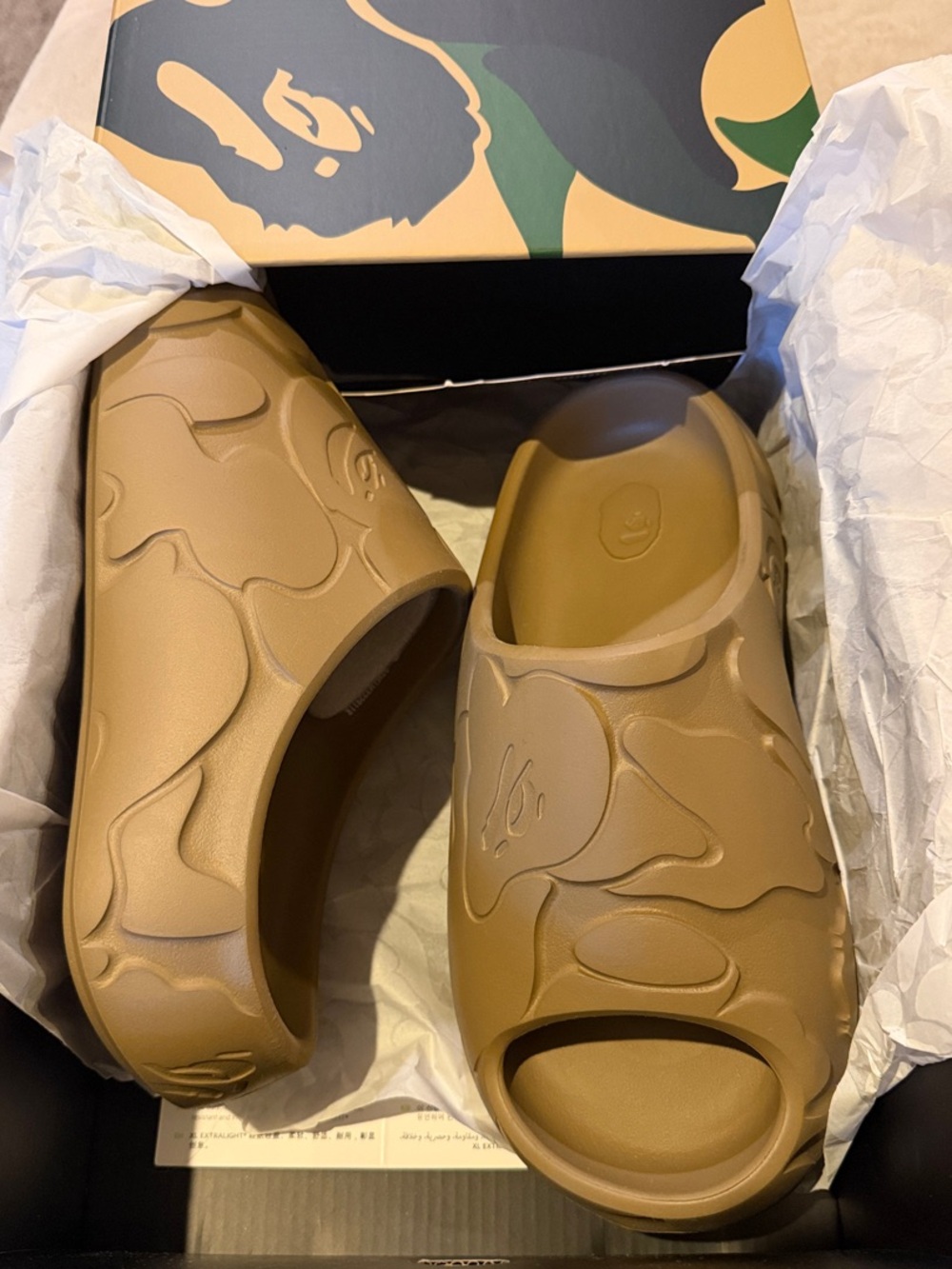 A Bathing Ape Men's Slide Sandals in Tan with Textured Camouflage Pattern